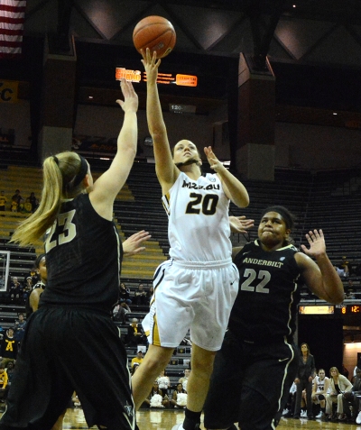 Missouri forward Kayla McDowell (20) beats Vanderbilt defenders MarquÕes Webb (22) and Kylee Smith (23) to the basket for a layup. McDowell had 13 points and eight rebounds off the bench.