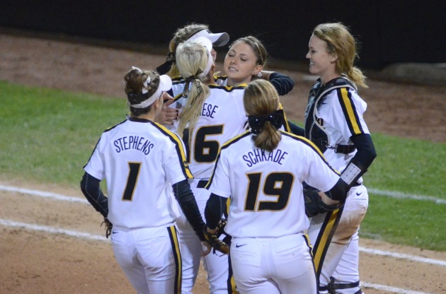 Missouri pitcher Tori Finucane hugs Corrin Genovese after recording the final out on Thursday, May 1, 2014 at University Field in Columbia, Mo.  The Tigers will play Bradley University in the second game of the NCAA softball regional held at University Field on Friday at 4:00 p.m.