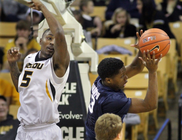 Missouri’s D’Angelo Allen (5) tries to knkock the ball away from Xavier’s Brandon Randolph on Dec. 13, 2014 in Columbia. Allen scored 8 points in 11 minutes of play.